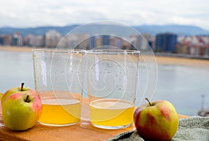 Traditional natural Asturian cider made fromÂ fermented apples in wooden barrels should be poured from great height for air